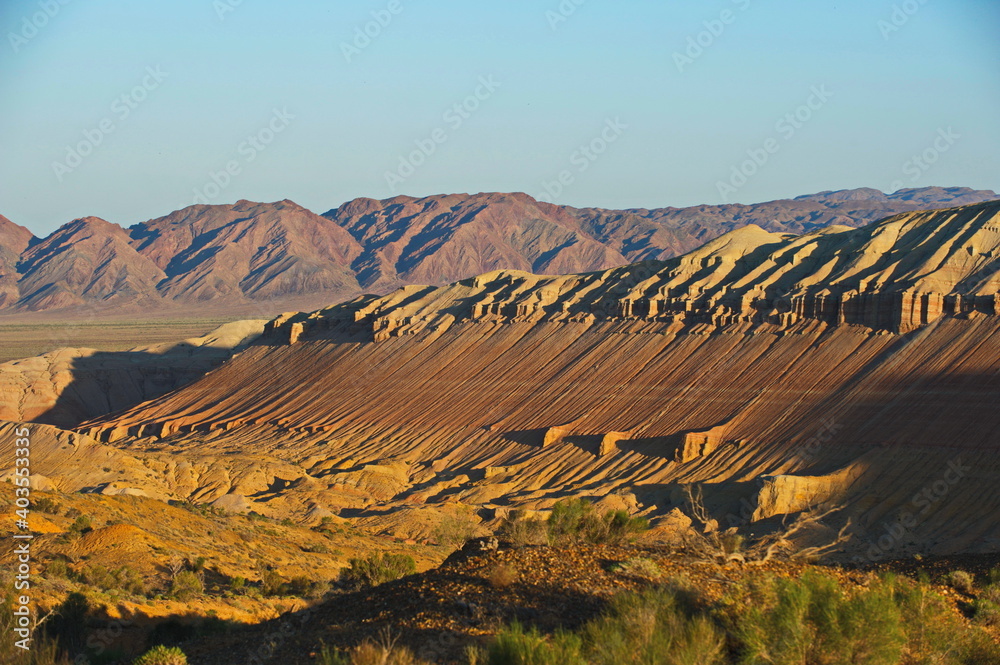 Naklejka premium Almaty, Kazakhstan - 06.25.2013 : Sand and stony hills with rocks of different colors in the Altyn Emel Nature Reserve