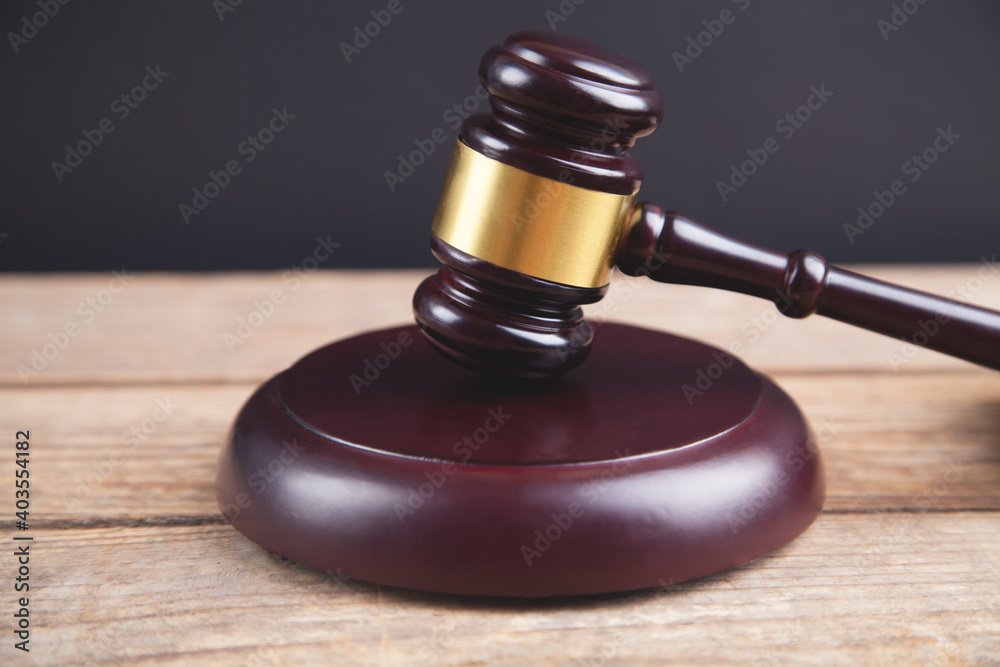 Law and justice concept. Wooden background. Law and justice concept. Wooden background.