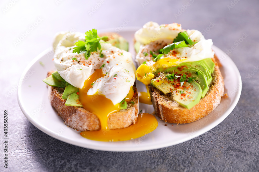 bread toast with poached egg and avocado