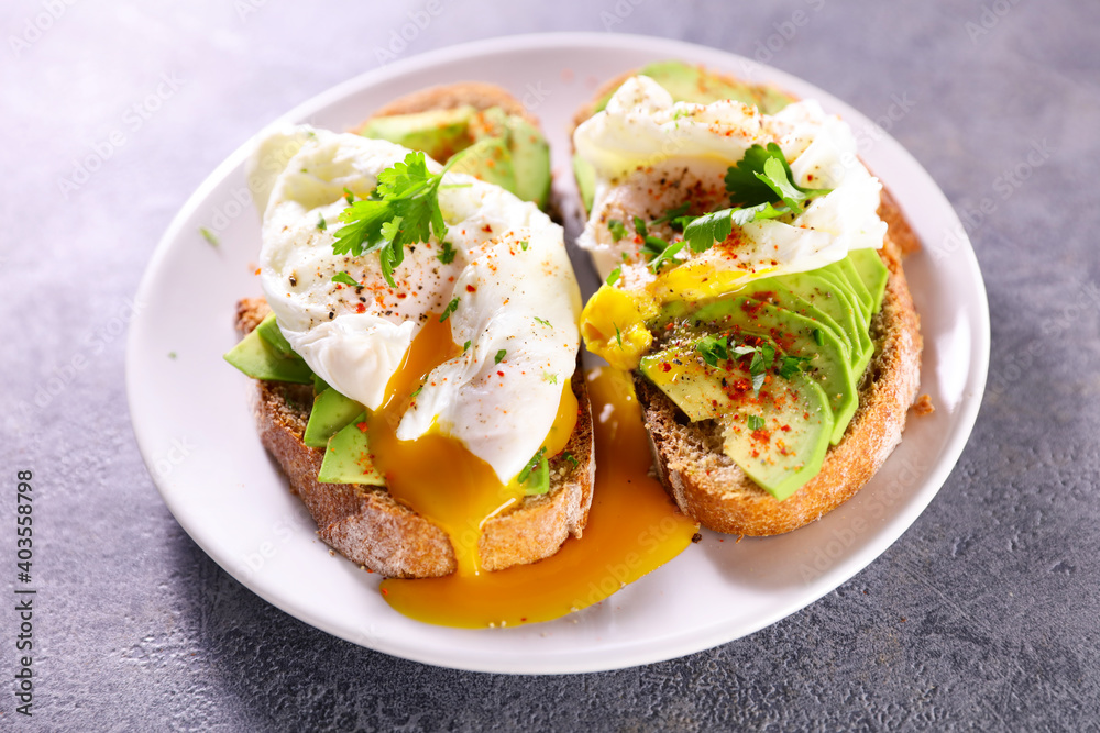 bread toast with poached egg and avocado