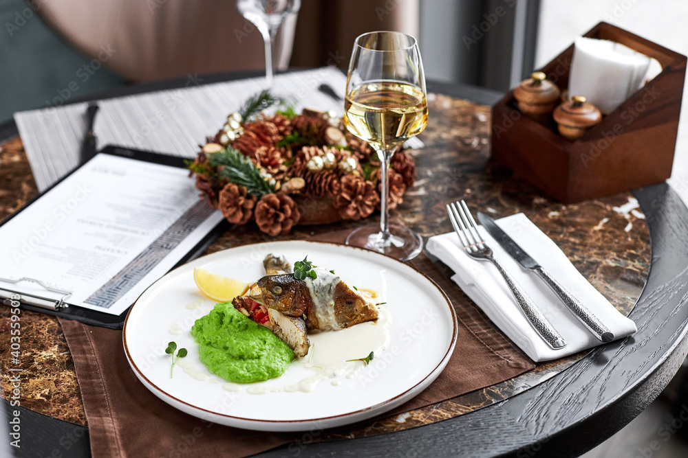 Trout with wine sauce and green pea puree