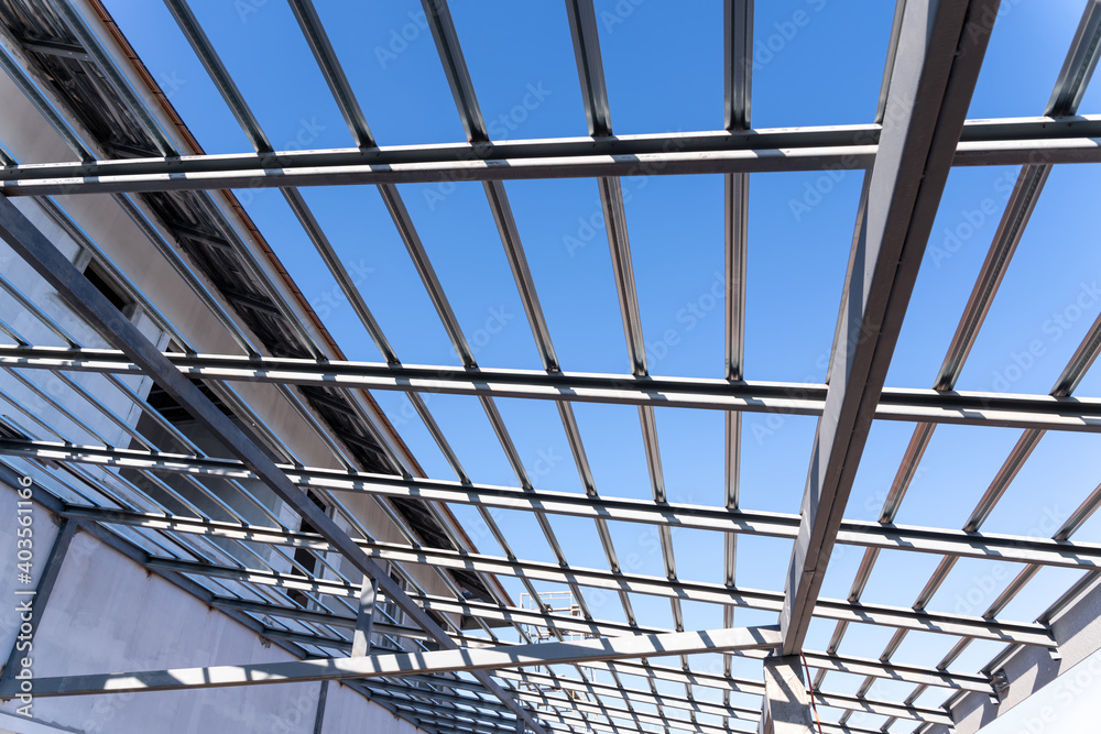 Steel roof frame for building under construction site. Steel roof frame for building under construction site.