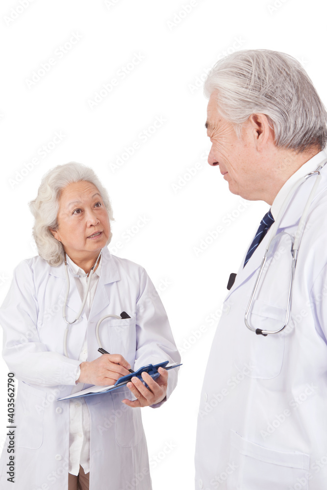 Standing portraits of two elderly senior doctors Standing portraits of two elderly senior doctors