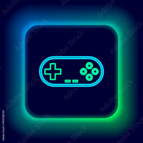 Glowing neon line Gamepad icon isolated on black background. Game controller. Colorful outline concept. Vector.