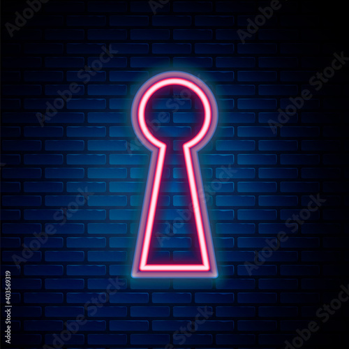 Glowing neon line Keyhole icon isolated on brick wall background. Key of success solution. Keyhole express the concept of riddle, secret, safety, security. Colorful outline concept. Vector.
