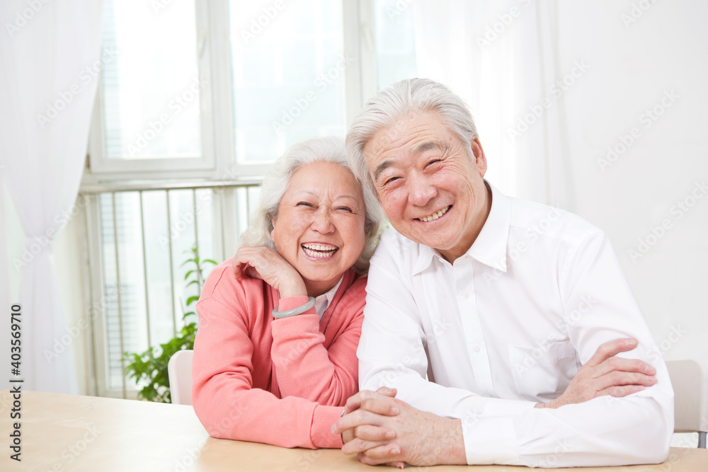 A group photo of a happy old couple A group photo of a happy old couple