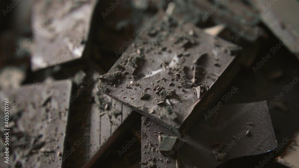 Delicious dark chocolate on black dish Delicious dark chocolate on black dish
