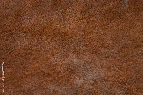 texture of genuine leather is brown with scuff