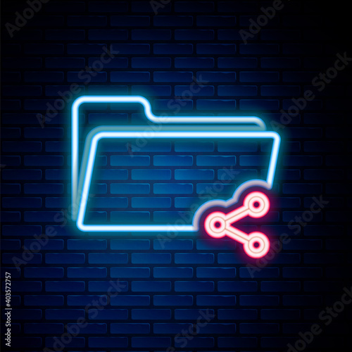 Glowing neon line Share folder icon isolated on brick wall background. Folder sharing. Folder transfer sign. Colorful outline concept. Vector.