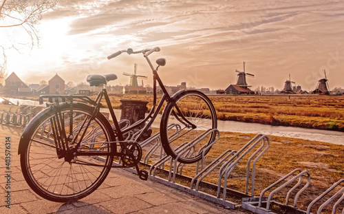 Old bike and windmills in Zaanse Schans, Netherlands