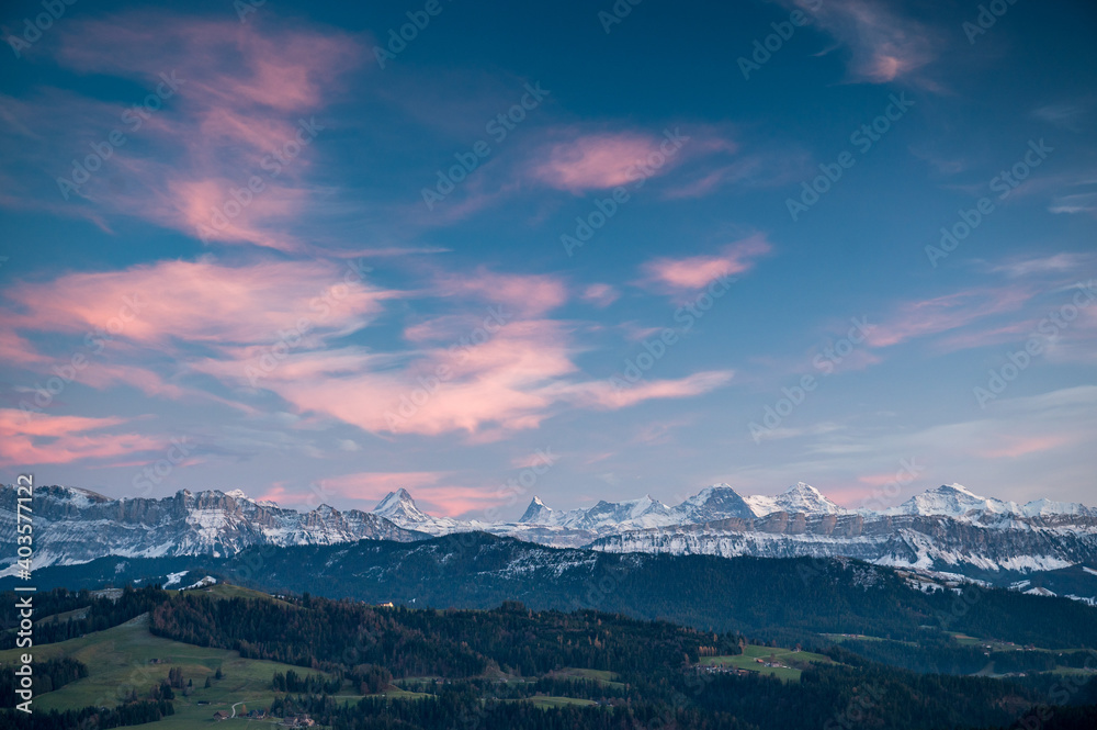 Bernese Alps at blue hour with the hills of Emmental in front