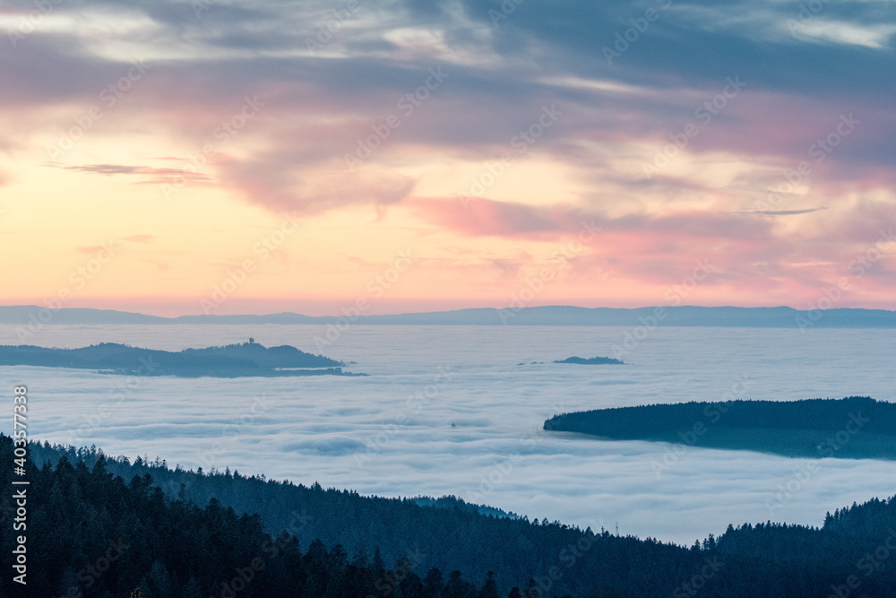 Gurten and Berner Mittelland over sea of fog at sunset