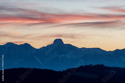 peak of Stockhorn at an autumn sunset  with hills of emmental