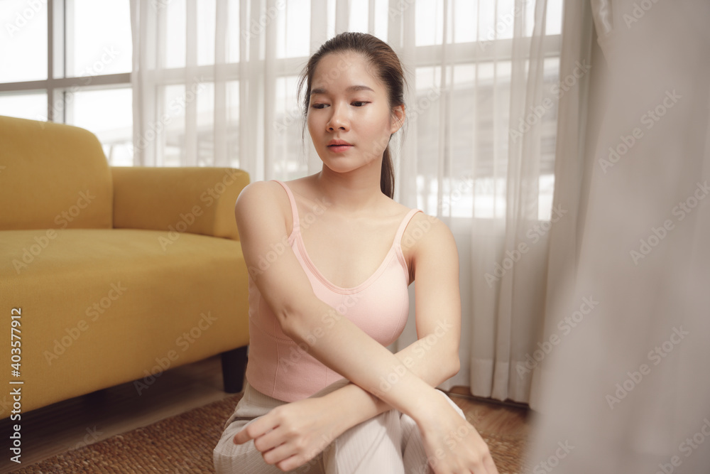 Beauty woman with healthy skin sitting on the floor. Beauty woman with healthy skin sitting on the floor.