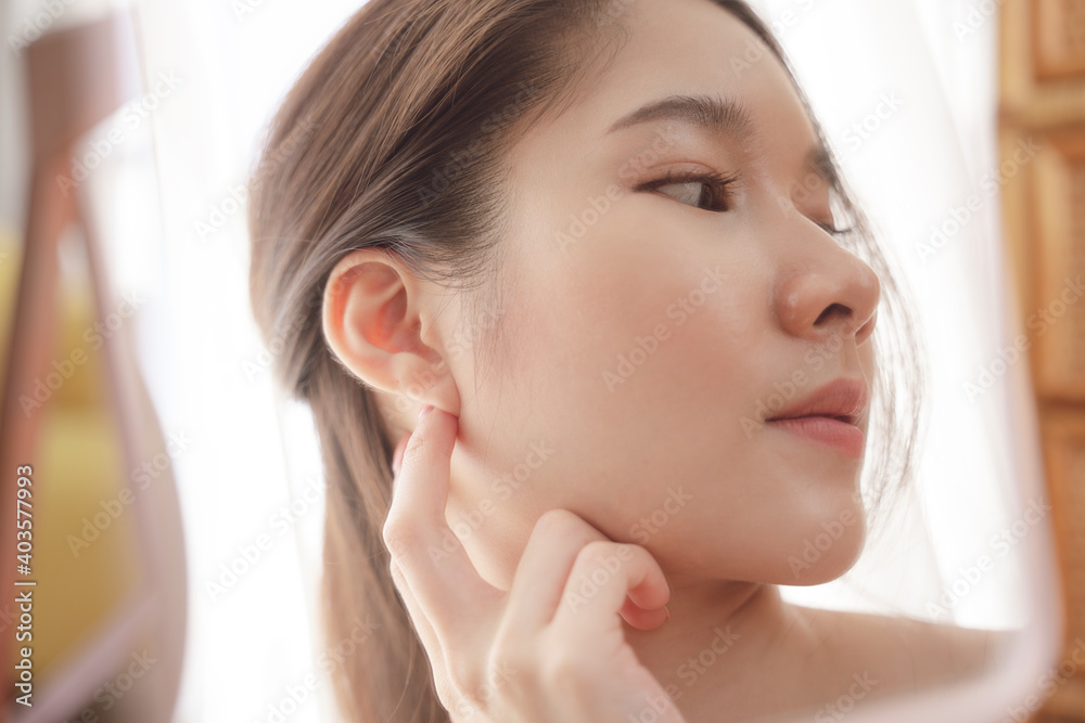 Asian beauty woman model showing left ear for mock up earrings. Asian beauty woman model showing left ear for mock up earrings.