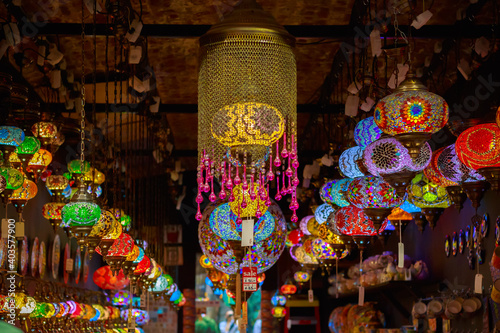 Turkish or Moroccan glass tea light hanging lantern displayed at Camden Market in London photo