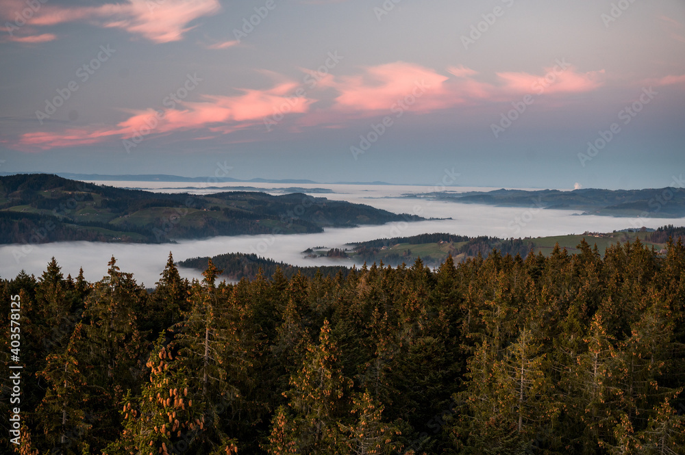 hills of Emmental at an autumn sunset with sea of fog