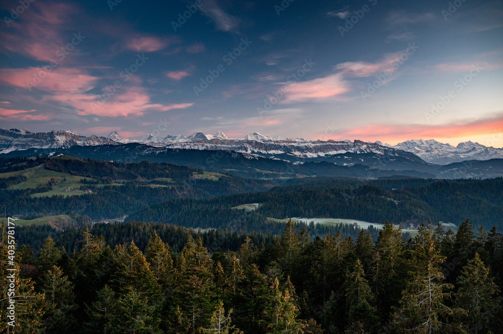 Bernese Alps at an autumn sunset with the hills of Emmental in front