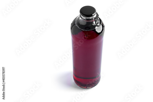 Cherry alcoholic drink in a bottle isolated on a white background.