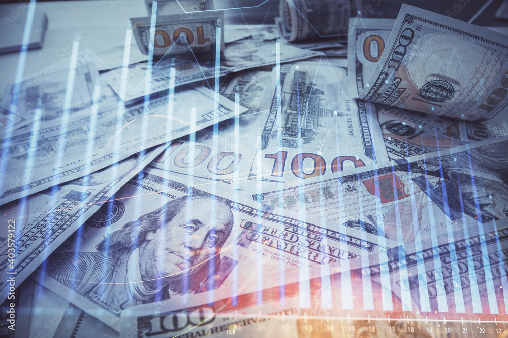 Multi exposure of forex chart drawing over us dollars bill background. Concept of financial success markets. Multi exposure of forex chart drawing over us dollars bill background. Concept of financial success markets.