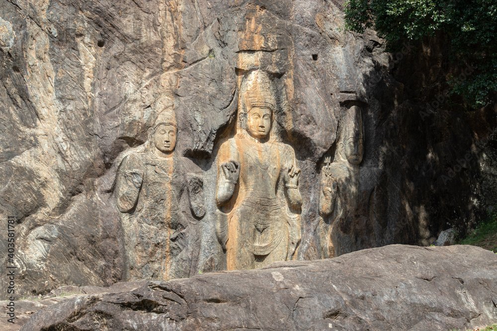Buddhist mythological figure-the Bodhisattva Avalokitesvara in Buduruwagala Buddhist temple in Wellawaya, gigantic seven statues date back to the 10th century,