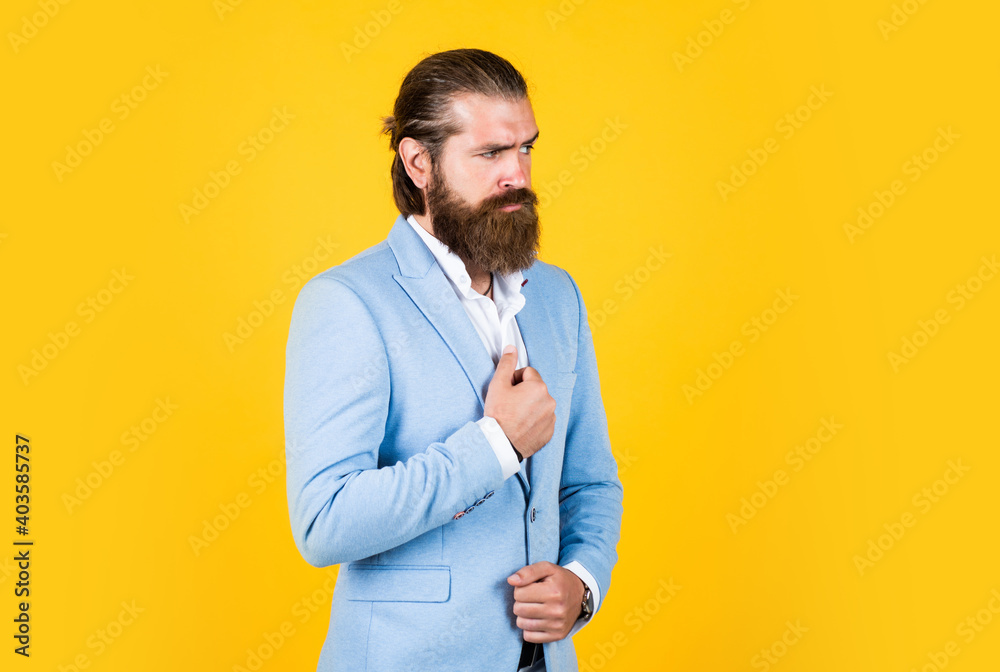 Confident and handsome. glamour bride groom. man on formal event. male business fashion. hipster in blue jacket. barbershop concept. Intelligent Businessman with beard. Bearded Man In classical style Confident and handsome. glamour bride groom. man on formal event. male business fashion. hipster in blue jacket. barbershop concept. Intelligent Businessman with beard. Bearded Man In classical style