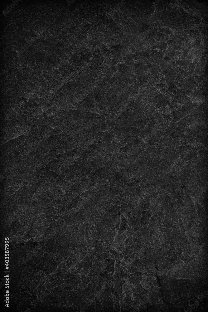 Naklejka premium Dark grey black slate background or texture.