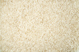 White long basmati rice textured background. Gluten free food.