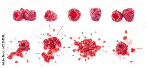 Smashed raspberries isolated on white photo