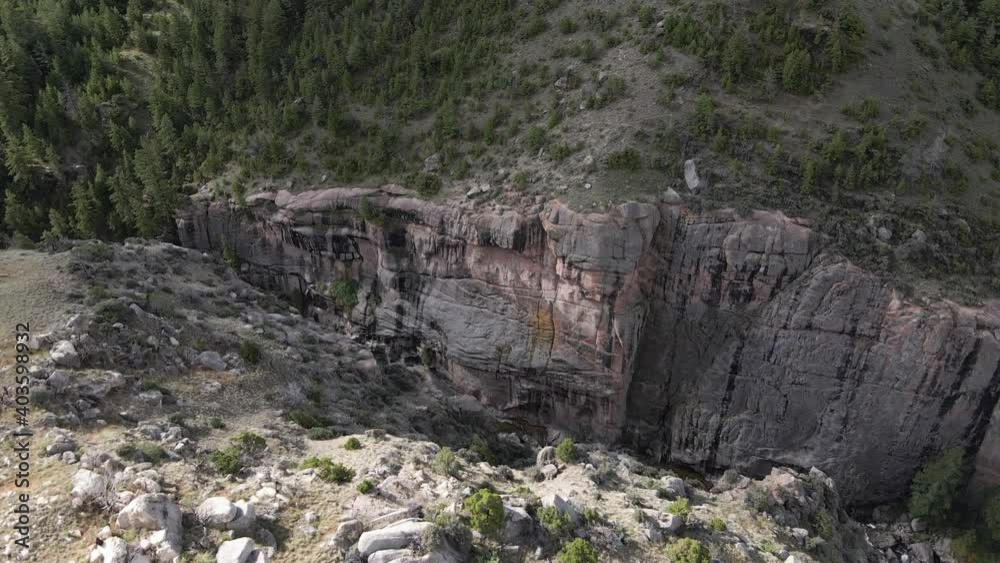 Aerial view of Shell Creek and its steep, rocky canyon walls along route 14 in Wyoming on a summer day Aerial view of Shell Creek and its steep, rocky canyon walls along route 14 in Wyoming on a summer day