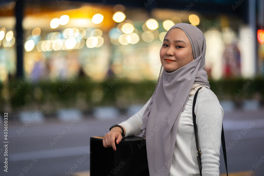 Young teenager waiting vehicle at stop station. Young teenager waiting vehicle at stop station.