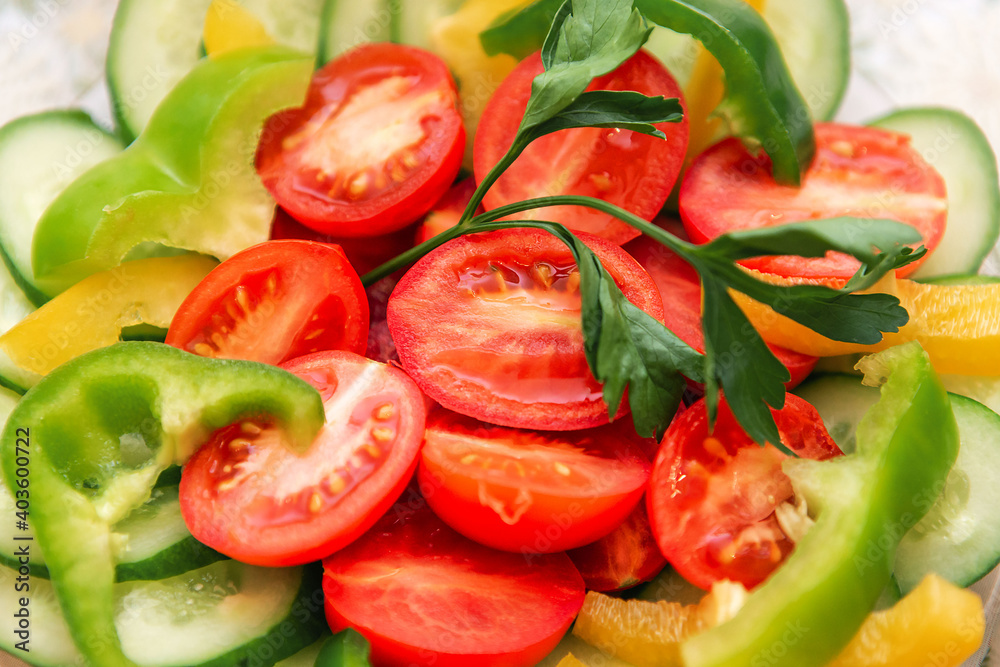 salad, tomatoes, peppers in a plate. Sliced vegetables, bright colors. salad, tomatoes, peppers in a plate. Sliced vegetables, bright colors.