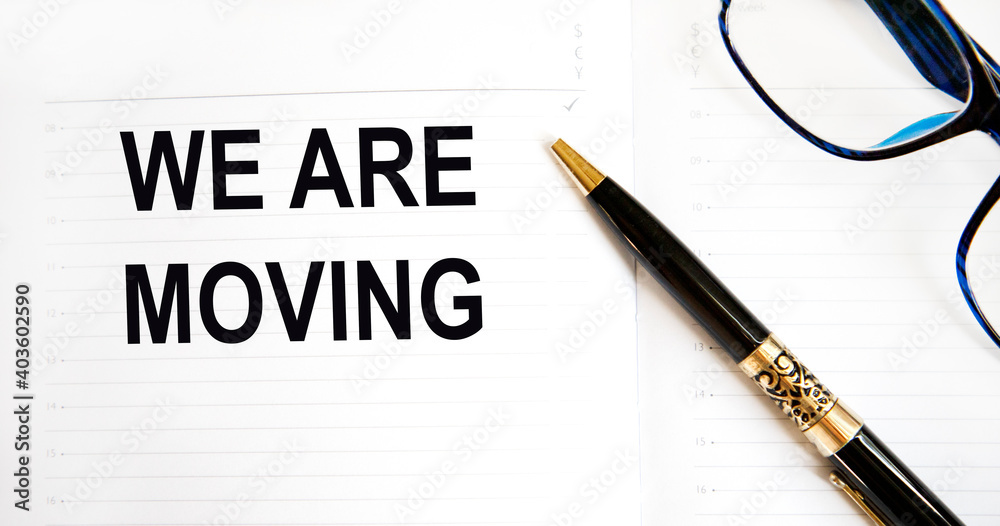 In the diary text We Are Moving, next to the pen, glasses.