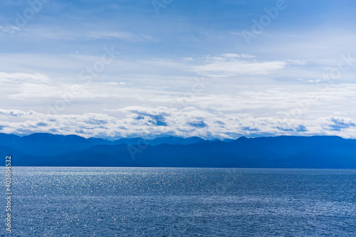 Landscape of lake Baikal sky, clouds and mountains