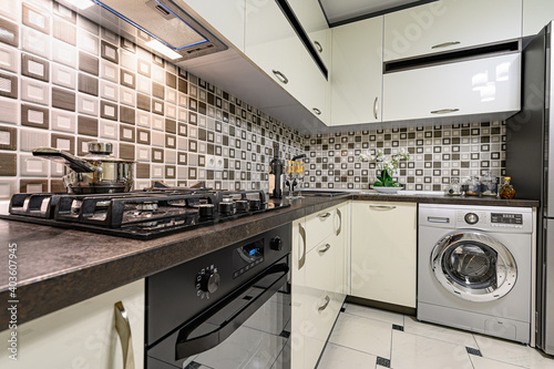 Brown and white modern kitchen interior photo