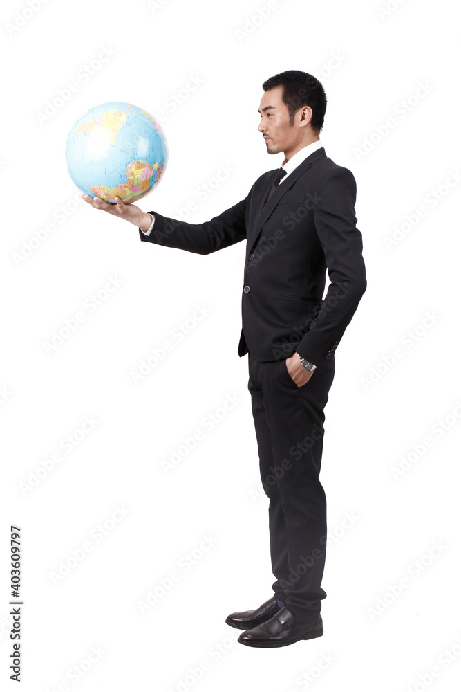 A young business man holding terrestrial globe A young business man holding terrestrial globe