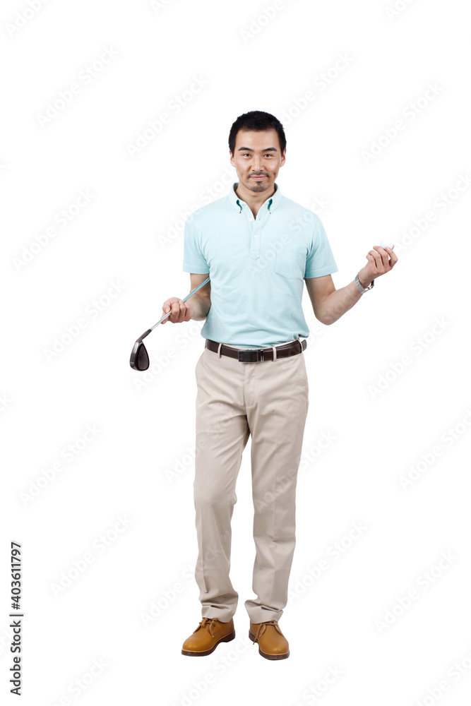Young man wearing a suit and golfing Young man wearing a suit and golfing