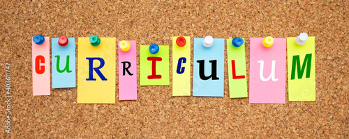 Color notes with letters pinned on a board. Word curriculum.