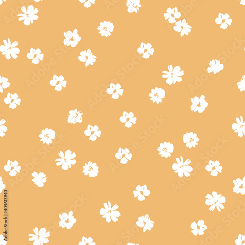 Small white flowers on a mustard background seamless pattern design. Trendy illustrated vector pattern for brand identity, stationery, wrapping, and wallpapers. Minimalistic floral background.