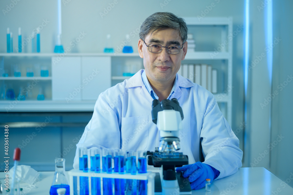 Fototapeta premium Portrait of scientist during experiment in laboratory, Science and technology healthcare concept
