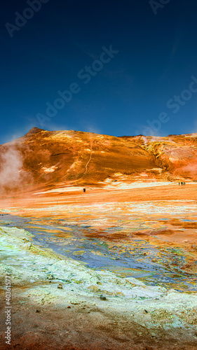 Martian landscape at Hverir geothermal active zone near Myvatn lake in Iceland at blue deep sky, summer