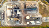 Aerial view of Oil and gas industry  facility for storage of oil and petrochemical products.Refinery oil and gas factory power and fuel energy.engineering concept.
