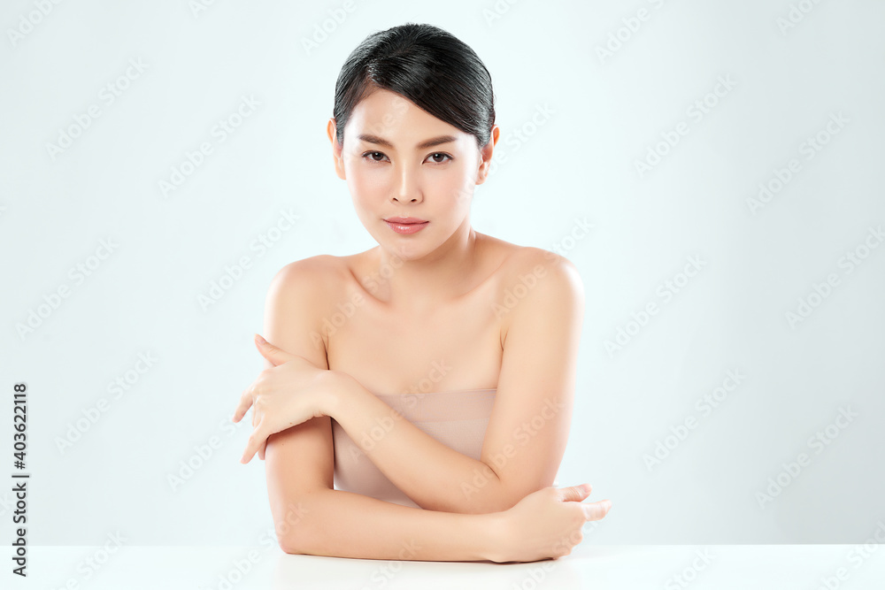 Beautiful Young asian Woman with Clean Fresh Skin, on Pink background, Face care, Facial treatment. Cosmetology, beauty and spa. Asian women portrait Beautiful Young asian Woman with Clean Fresh Skin, on Pink background, Face care, Facial treatment. Cosmetology, beauty and spa. Asian women portrait