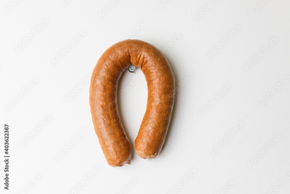 Horseshoe for happiness is made from sausage Horseshoe for happiness is made from sausage