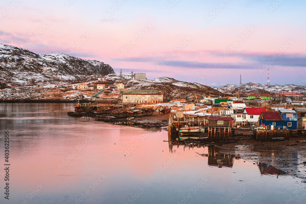 Arctic village on the shore of the Barents sea. Amazing view of winter Teriberka.