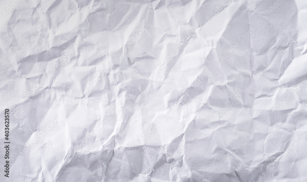 Close-up white crumpled paper texture background.