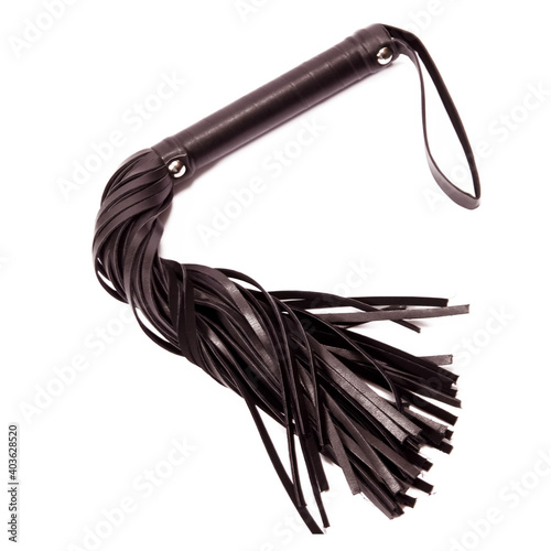 Black whip bdsm made of leather. Toy for sexual games BDSM.