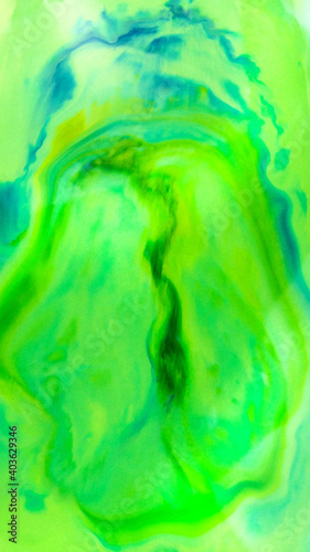 Blue liquid digital painting is spreading on green liquid