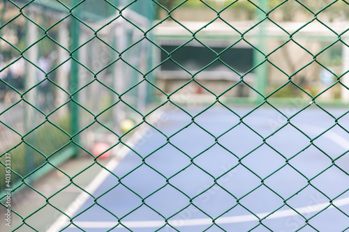 Iron wire fence. Fence grilles rust texture background. Fence Steel Background. © kanpisut