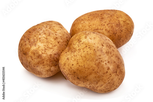 Unwashed potatoes, isolated on white background